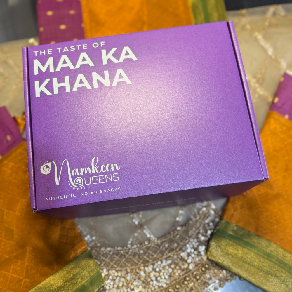 Purple box of Maa Ka Khana Namkeen Queens on a colorful background